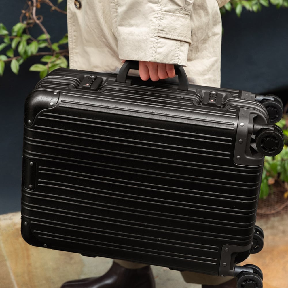 LUGGAGE ALUMINIUM - Maleta Rígida De Aluminio Con Doble Cierre TSA Y Ruedas Multidireccionales Negro