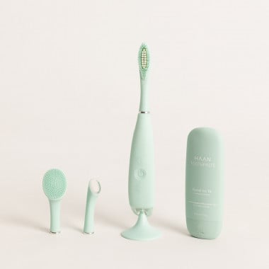 Kopen SONIC BEAUTY Elektrische tand- en gezichtsborstel + HAAN TANDPASTA 55ml fles tandpasta.